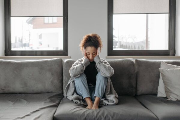 woman sitting on a sofa