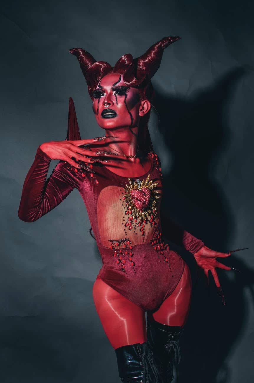 woman in red demon costume